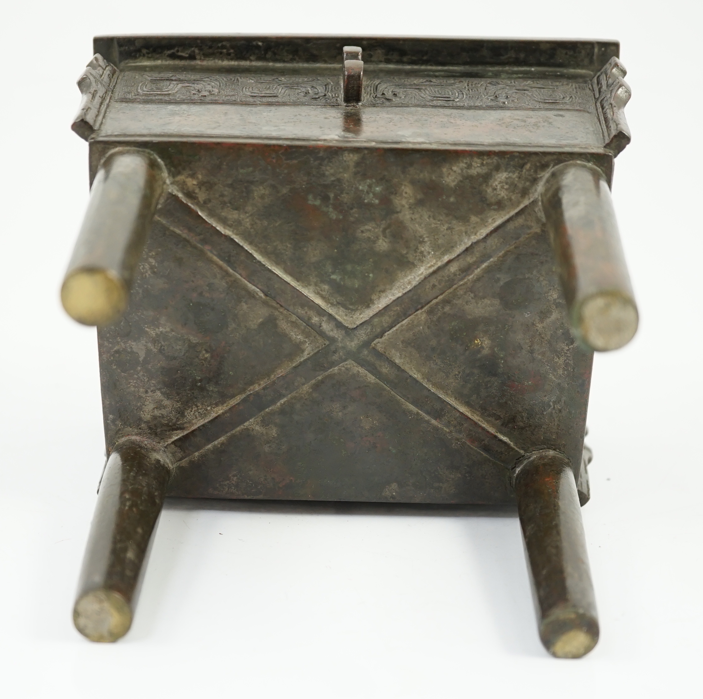 A Chinese archaistic bronze vessel, fangding, 17th/18th century, old repair to one leg